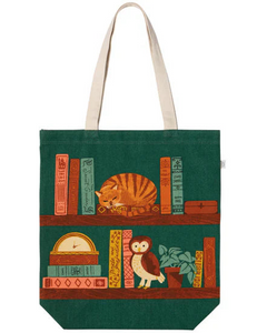 Tote bag with a design of a cat and owl on a bookshelf against a green background